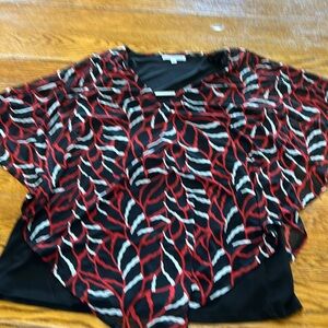 Linda Matthews red and black bat wing blouse. Size Large.